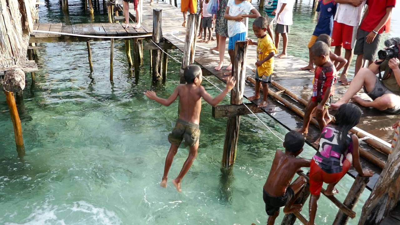 explore the village of raja ampat