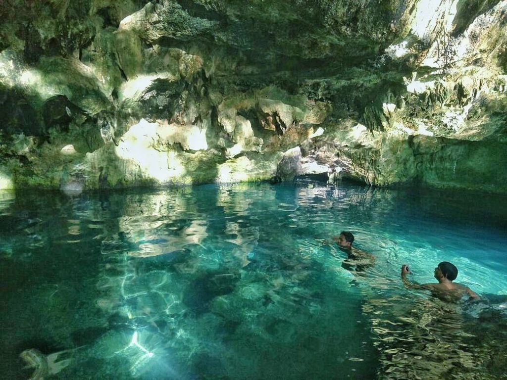 Taking Bath at Kontamale Cave