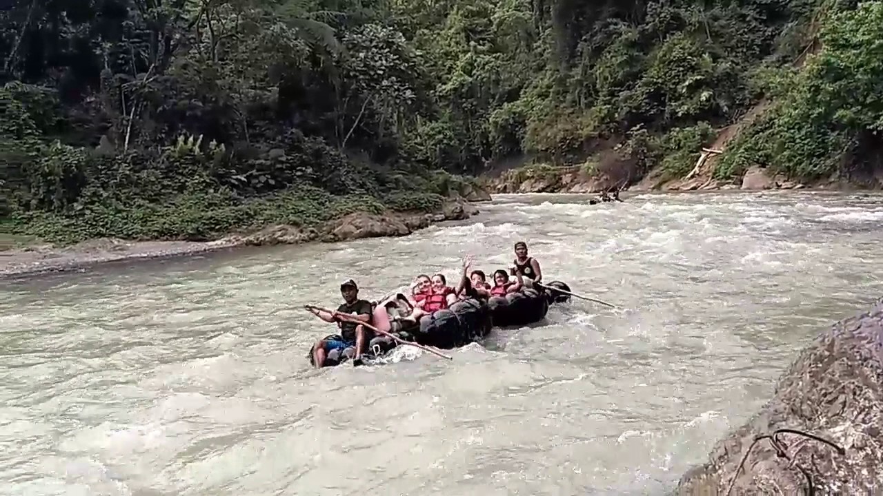 tubing in the river of bukit lawang