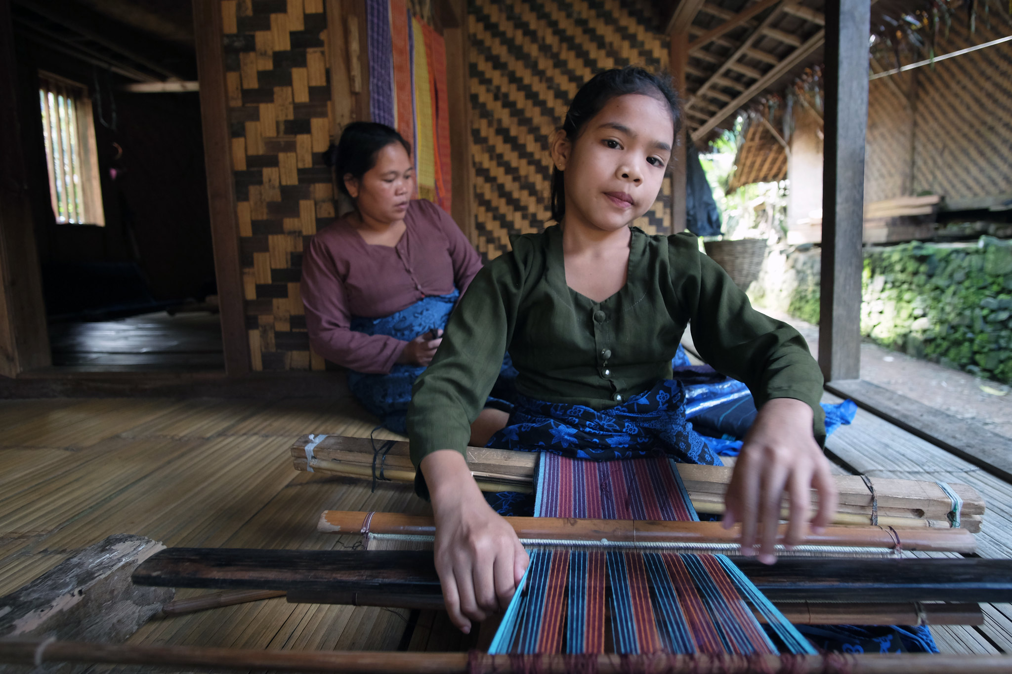 baduy woman weaving activity