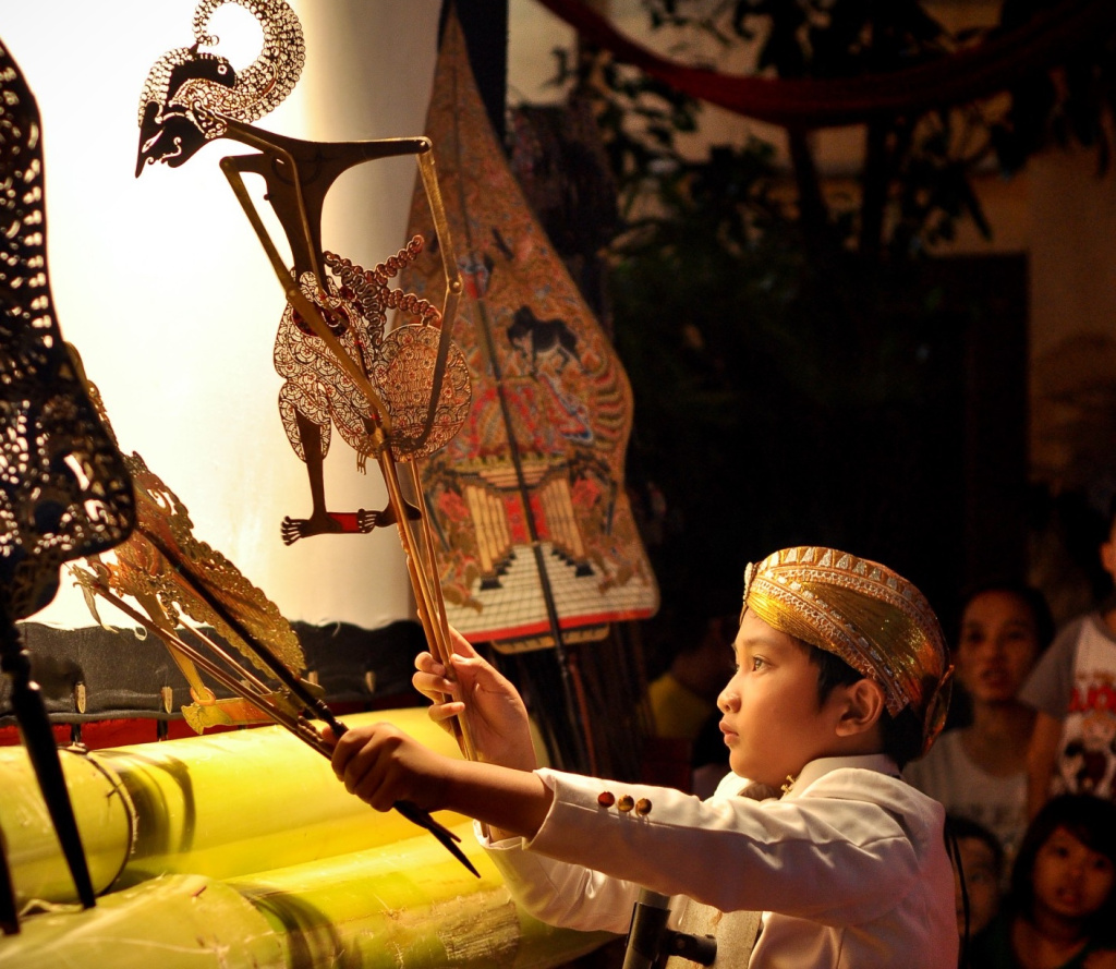 mastering the wayang kulit tradition by the young puppeteer